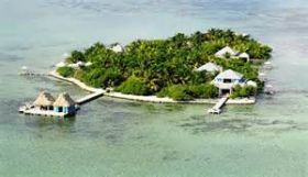 private island  with huts over the water, Belize – Best Places In The World To Retire – International Living
